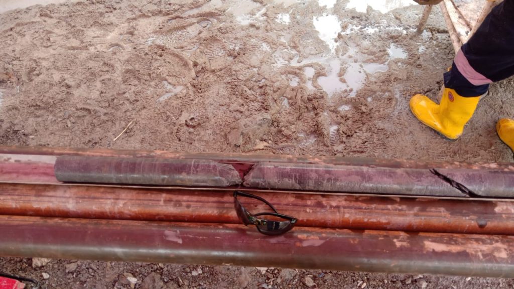 Core from 1st hole Jugan 14 Nov 2012 (colour from light shining through red tarpauline sun shade)