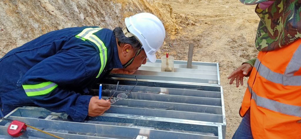 Nate inspecting core at Rig #2-JUDDh89. 29 Dec 2021